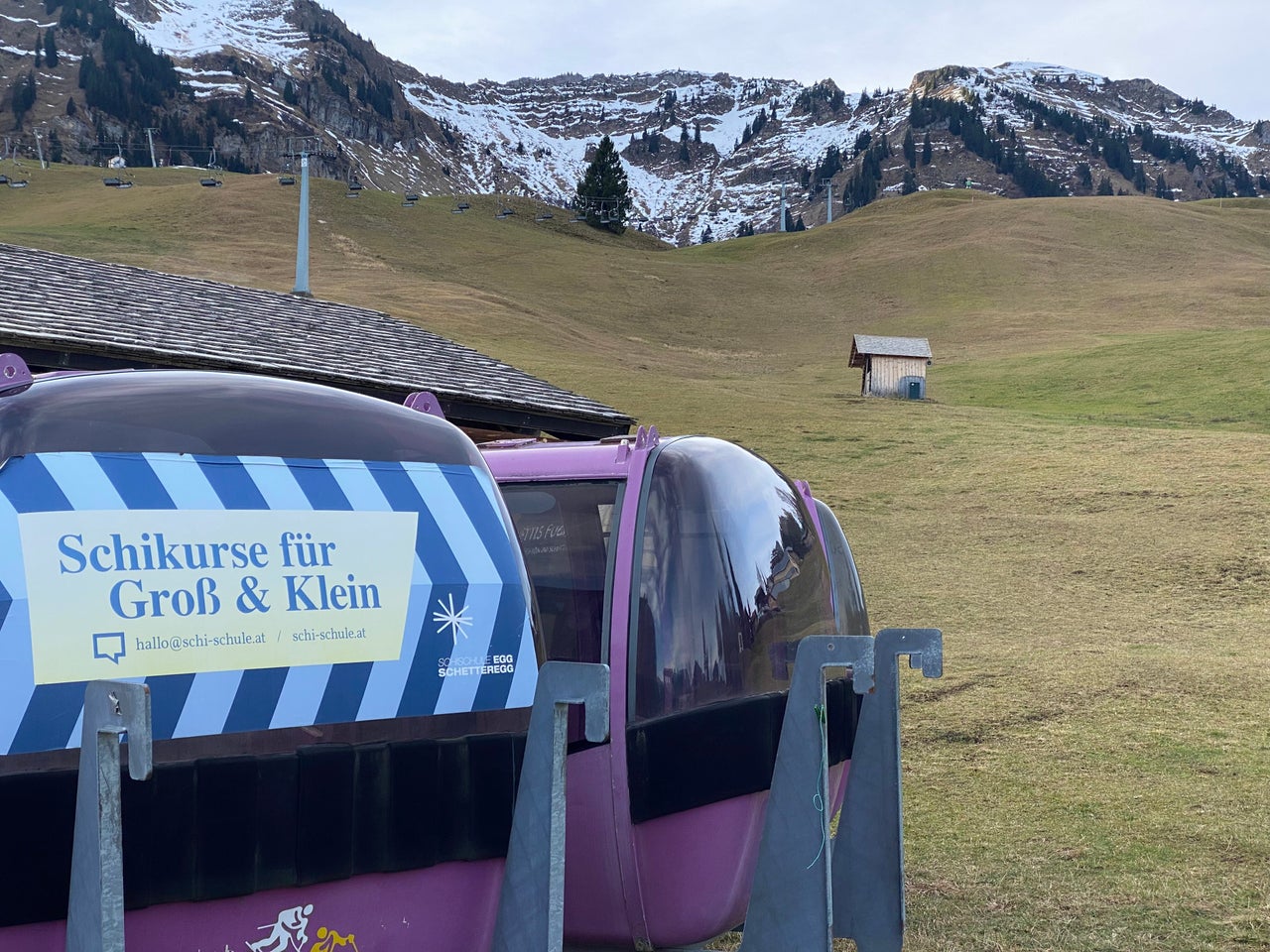 02 January 2023, Austria, Schetteregg: Completely green and without snow is a slope at a lift in the ski resort Schetteregg. It is currently much too warm here for the time of year. Photo: Benedikt von Imhoff/dpa (Photo by Benedikt von Imhoff/picture alliance via Getty Images)