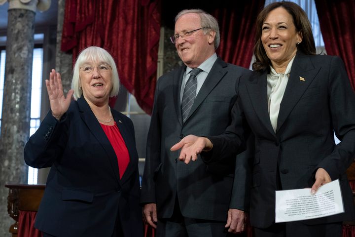 Vice President Kamala Harris leads a ceremonial swearing-in for Sen. Patty Murray (D-Wash) with her husband, Rob Murray, on Tuesday.