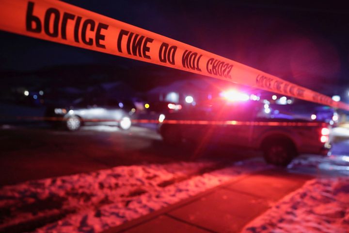 Police tape surrounds the crime scene in Enoch, Utah on Wednesday.
