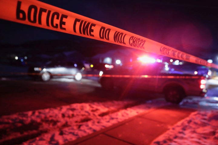 Police tape surrounds the crime scene in Enoch, Utah on Wednesday.