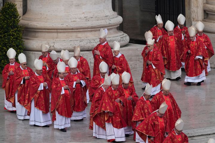 Cardinals arrive in St. Peter's Square at the Vatican ahead of the funeral mass for late Pope Emeritus Benedict XVI on Thursday.