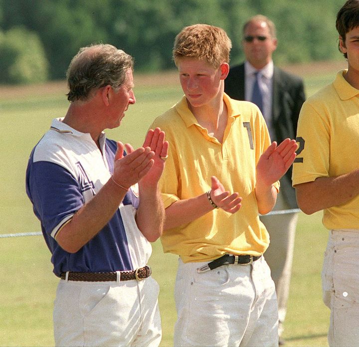 Prince Harry with his dad Prince Charles, the future king, in 2001, the year the young royal apparently lost his virginity.