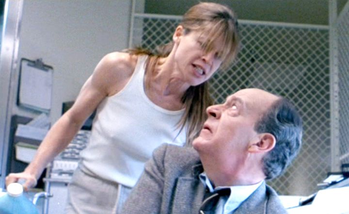 Linda Hamilton (as Sarah Connor) confronts Earl Boen's character Dr. Peter Silberman in a scene from Terminator 2: Judgment Day.