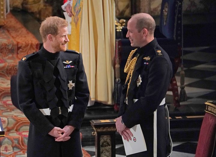 Princes Harry and William pictured on the day of the former's wedding