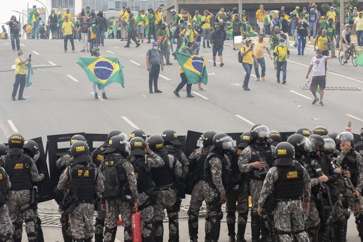 Supporters of former President Jair Bolsonaro clash with security forces as they raid the National Congress in Brasilia, Brazil, 08 January 2023.