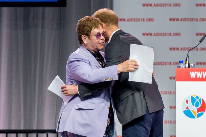 Sir Elton John and Prince Harry share a hug in 2018