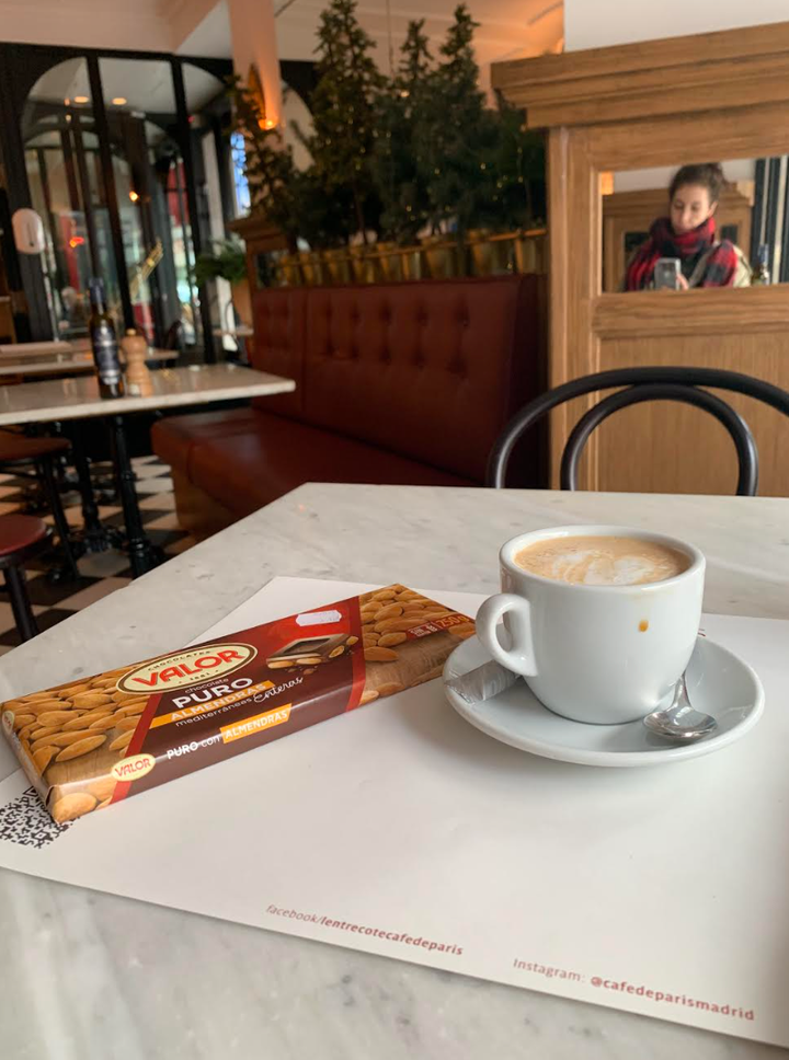 "Stopping for coffee after buying the chocolate bar," the author writes of this image from their visit to Madrid at the beginning of 2023.