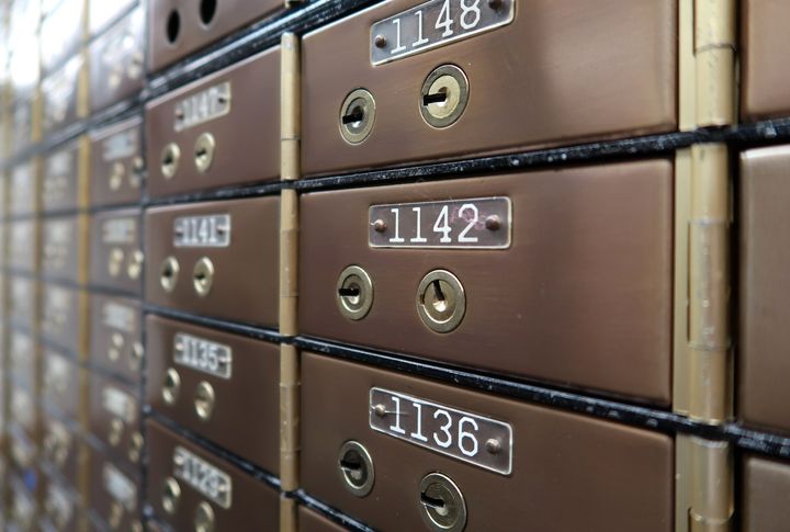 You can use a safety deposit box if you want to maintain possession of your gun but store it outside your home.