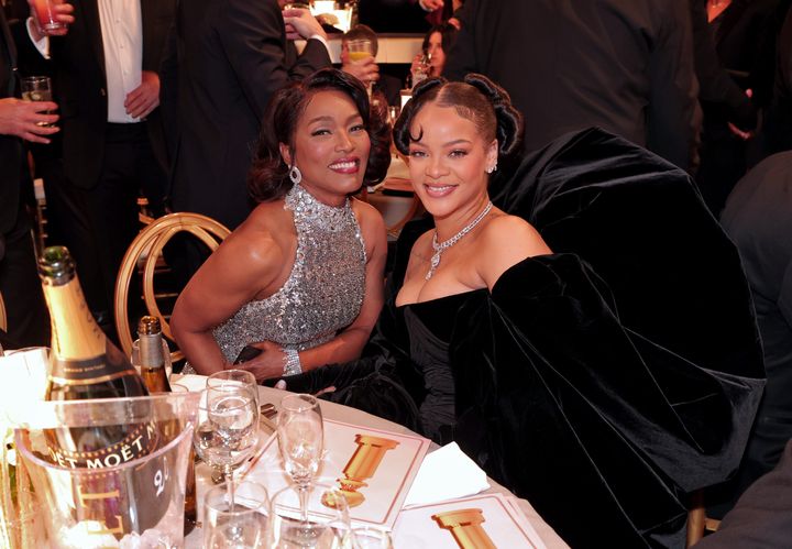 Angela Bassett (left) with Rihanna at the Golden Globes on Tuesday.