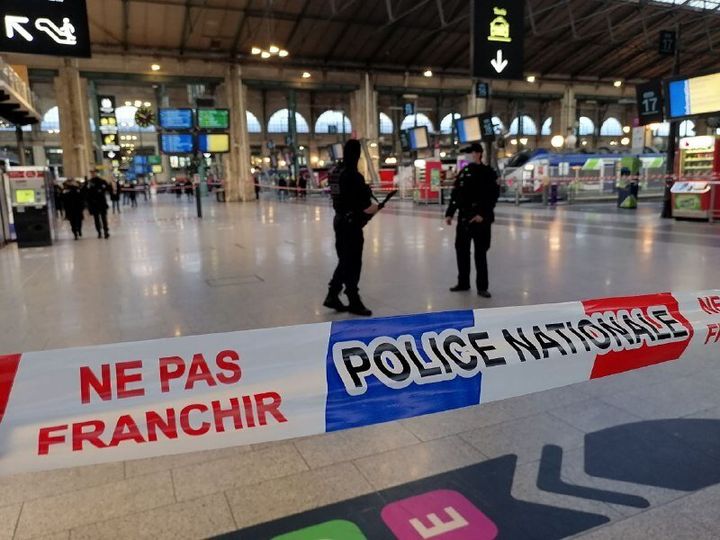French police cordon off an area at Gare du Nord train station, after a knife-wielding suspect injured six people, including a police officer, in Paris on Jan. 11, 2023.