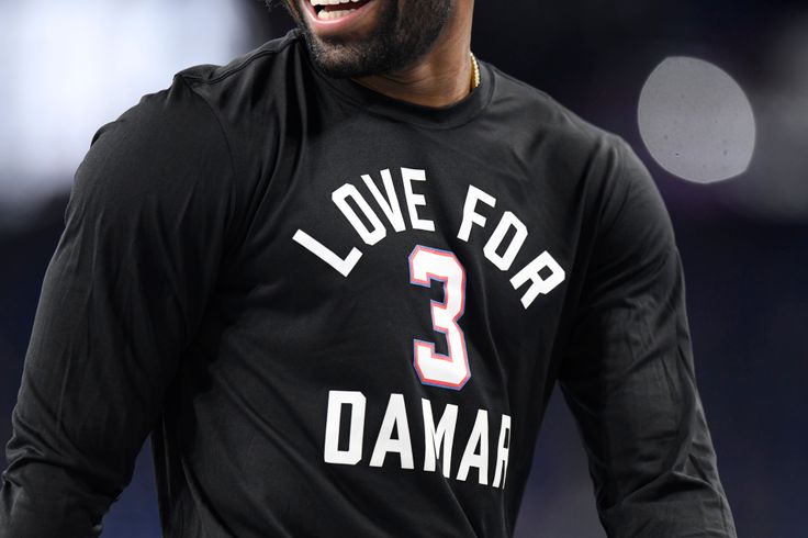 A player wears a shirt in support of Buffalo Bills safety Damar Hamlin during pre-game warm ups for the game between the Houston Texans and the Indianapolis Colts on Jan. 8, 2023, at Lucas Oil Stadium in Indianapolis, Indiana.