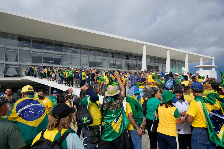 Supporters of Brazil's former President Jair Bolsonaro storm the Planalto Palace in Brasilia, Brazil, on Jan. 8, 2023.