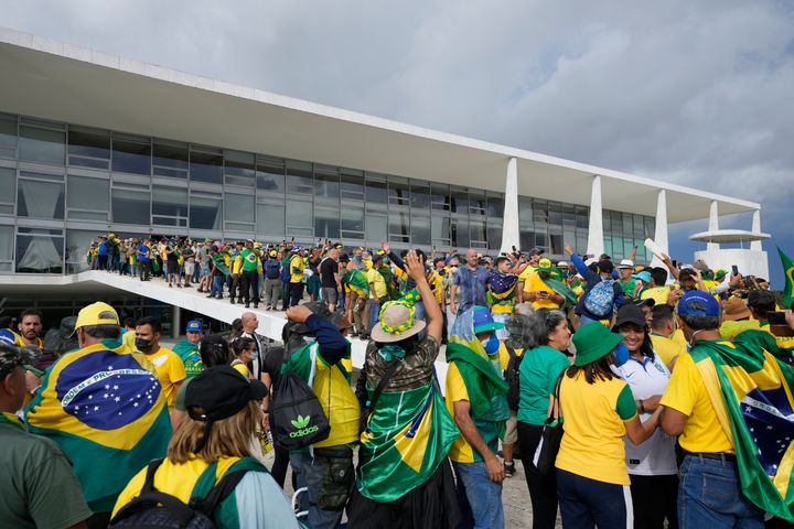 Supporters of Brazil's former President Jair Bolsonaro storm the Planalto Palace in Brasilia, Brazil, on Jan. 8, 2023. 