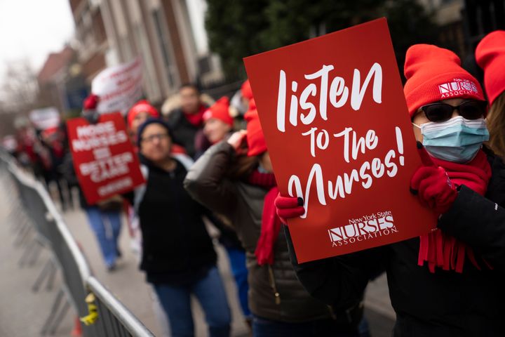 Protesters march on the streets around Montefiore Medical Center during a nursing strike, on Jan. 11, 2023, in the Bronx borough of New York.
