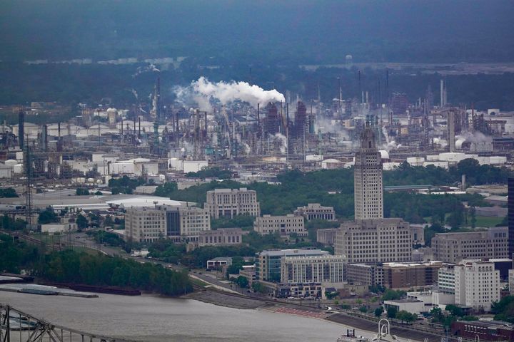 The Exxon Mobil Baton Rouge Refinery complex is seen last year with the Louisiana State Capitol, bottom right.