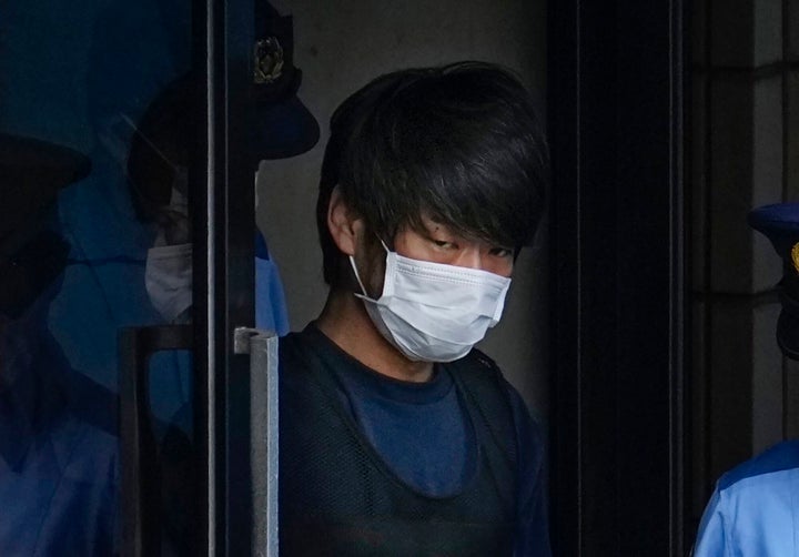 FILE – Tetsuya Yamagami exits a police station in Nara, western Japan in July 2022 while on his way to local prosecutors' office.