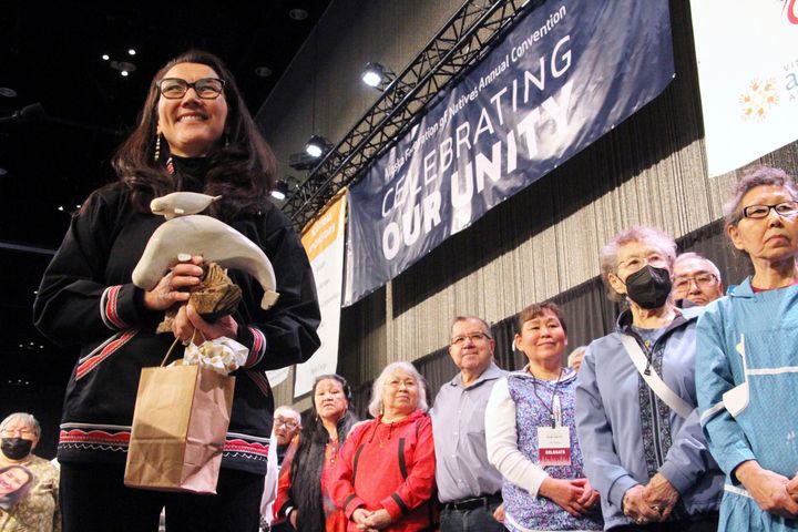 Rep. Mary Peltola, left, D-Alaska, acknowledges audience members singing a song of prayer for her at the Alaska Federation of Natives conference in Anchorage, Alaska, Oct. 20, 2022. Peltola, who is Yup’ik, said it was disappointing FEMA missed the mark with translations. 