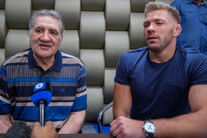 South African heavyweight boxing legend Gerrie Coetzee, left, and kickboxer Dricus du Plessis, right, pictured in 2022.