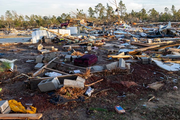 All the remains of a house on County Road 43 is the foundation, at left, in the aftermath from Thursday's severe weather, Thursday, Jan. 12, 2023, in Prattville, Alabama.