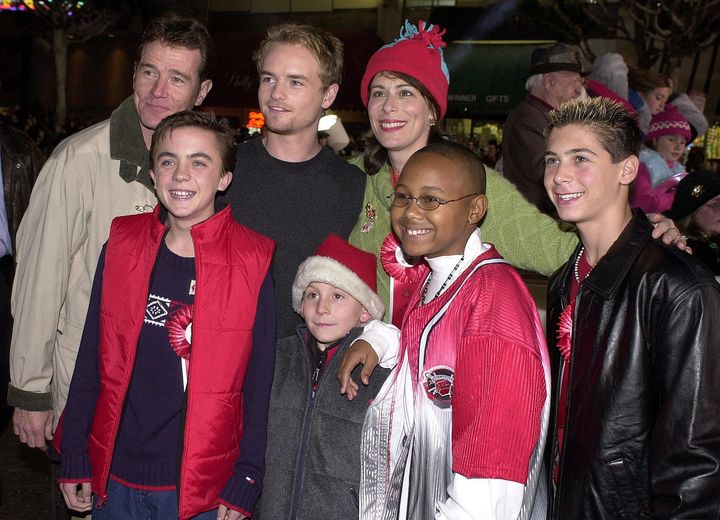 The cast of "Malcolm in the Middle" poses for a photo at the Hollywood Christmas Parade in 2000.