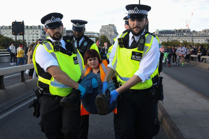 Climate activists march through London and occupy Waterloo Bridge on October 2nd 2022.