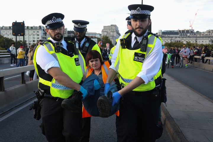 Climate activists march through London and occupy Waterloo Bridge on October 2nd 2022.