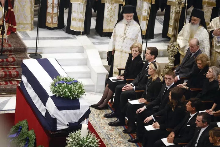 Greece's former Queen Anne Marie, former Crown Prince Pavlos and Princess Marie-Chantal, seen first row, former Spanish King Juan Carlos and Queen Sofia, second row, attend the funeral service of former king of Greece Constantine II at Metropolitan Cathedral in Athens on Jan. 16.