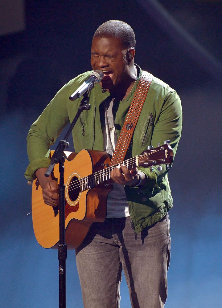C.J. Harris performs onstage at Fox's "American Idol XIII" Top 7 Live Performance Show on April 16, 2014, in Hollywood, California. 