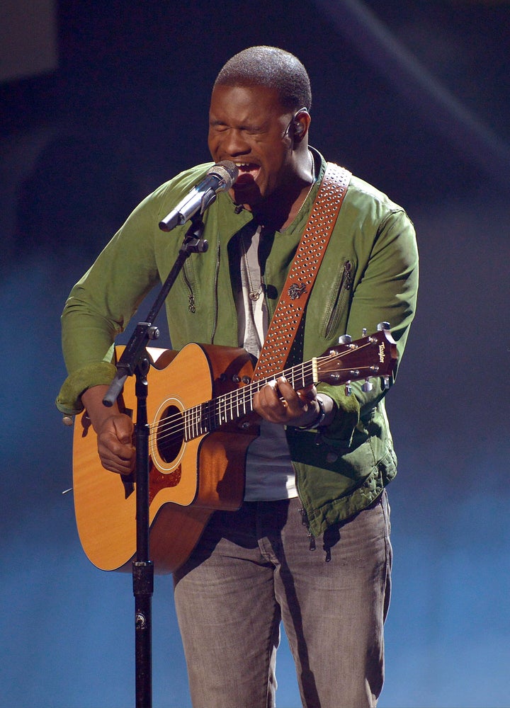 C.J. Harris performs onstage at Fox's "American Idol XIII" Top 7 Live Performance Show on April 16, 2014, in Hollywood, California.