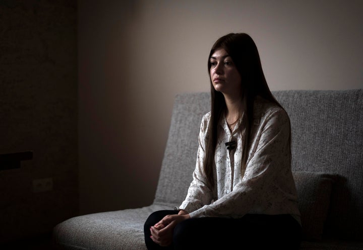 Alina Kapatsyna sits in a house in Dnipro, Ukraine, on Jan. 6, 2023. Men in military uniforms took her mother 45-year-old Vita Hannych away from her house in eastern Ukraine in April.