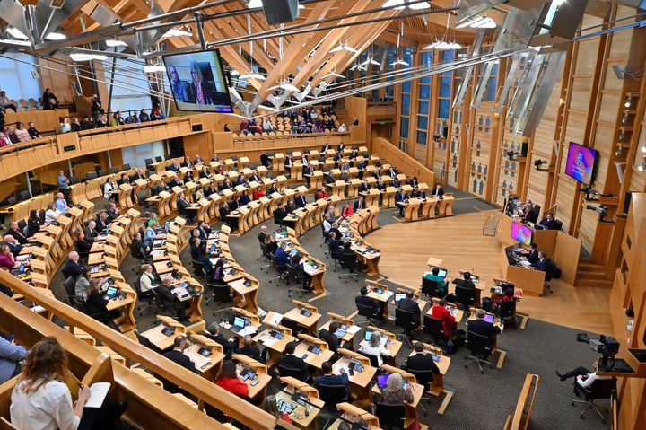 MSPs passing the Gender Recognition Reform (Scotland) Bill at the end of a specially extended session of the Scottish Parliament, after a debate which took place over three days, on December 22, 2022.