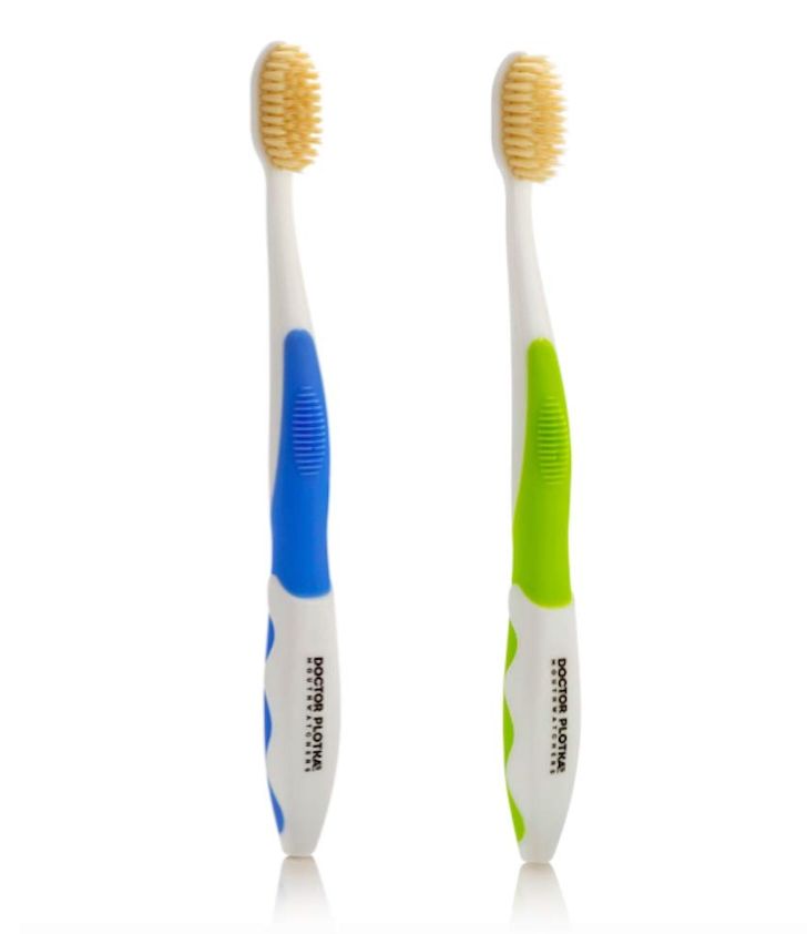 A "flossing toothbrush" with two layers of bristles