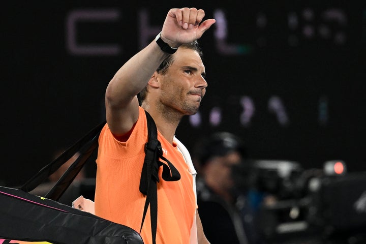 Spain's Rafael Nadal leaves after defeat against Mackenzie McDonald of the US in the men's singles on day three of the Australian Open tennis tournament in Melbourne on January 18, 2023. - -- IMAGE RESTRICTED TO EDITORIAL USE - STRICTLY NO COMMERCIAL USE -- (Photo by MANAN VATSYAYANA / AFP) / -- IMAGE RESTRICTED TO EDITORIAL USE - STRICTLY NO COMMERCIAL USE -- (Photo by MANAN VATSYAYANA/AFP via Getty Images)