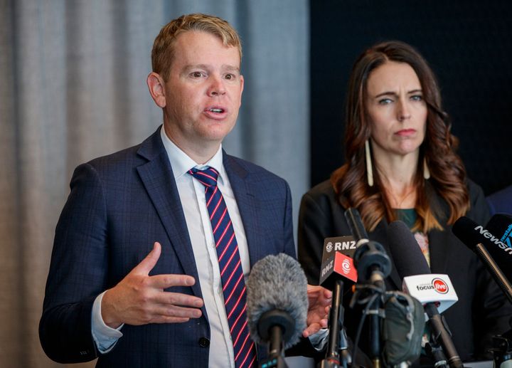 AUCKLAND, NEW ZEALAND - FEBRUARY 12: Minister for Covid-19 Response Chris Hipkins (L) and New Zealand Prime Minister Jacinda Ardern at the announcement about the arrival of the Pfizer/BioNTech vaccine on February 12, 2021 in Auckland, New Zealand. New Zealand's first COVID-19 vaccine is set to arrive next week with priority given to Border workers and their families. (Photo by Dave Rowland/Getty Images)