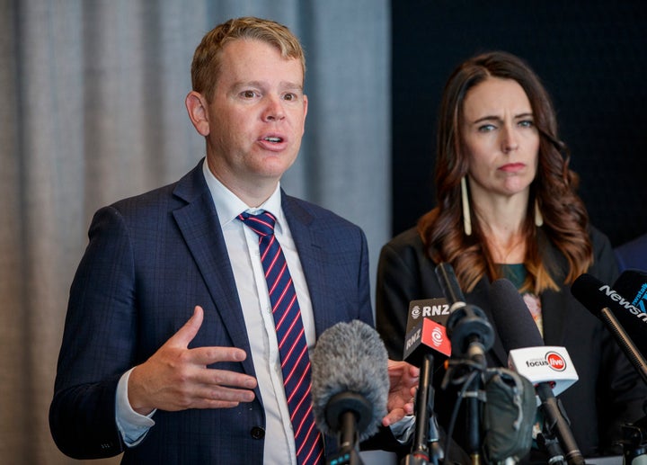 AUCKLAND, NEW ZEALAND - FEBRUARY 12: Minister for Covid-19 Response Chris Hipkins (L) and New Zealand Prime Minister Jacinda Ardern at the announcement about the arrival of the Pfizer/BioNTech vaccine on February 12, 2021 in Auckland, New Zealand. New Zealand's first COVID-19 vaccine is set to arrive next week with priority given to Border workers and their families. (Photo by Dave Rowland/Getty Images)