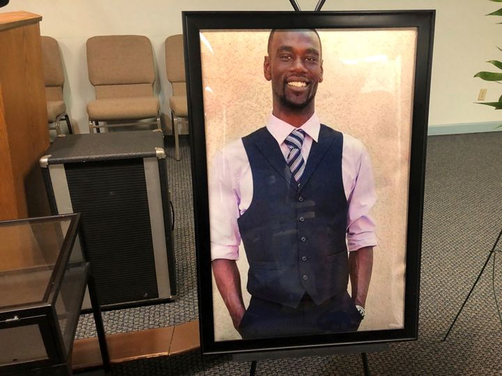 A portrait of Tyre Nichols is displayed at a memorial service for him on Tuesday in Memphis. He died after a traffic stop on Jan. 7. Five officers involved in his arrest have been fired.