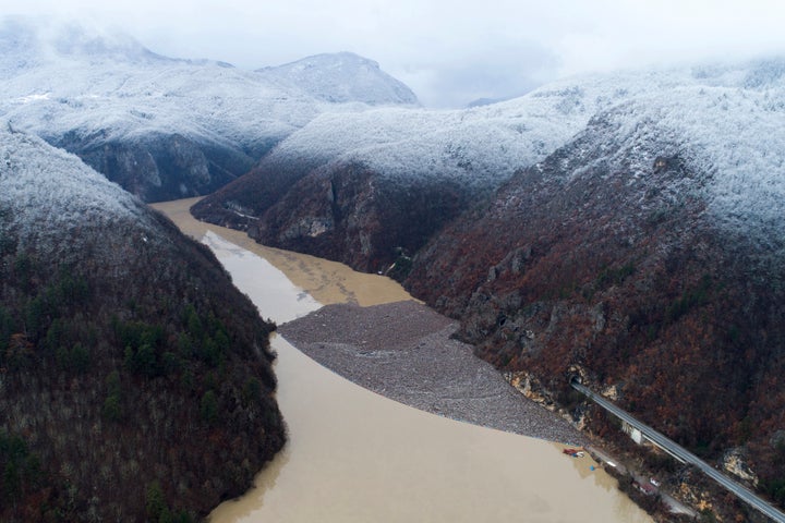 Aerial view of waste floating in the Drina river near Visegrad, Bosnia, Friday, Jan. 20, 2023.