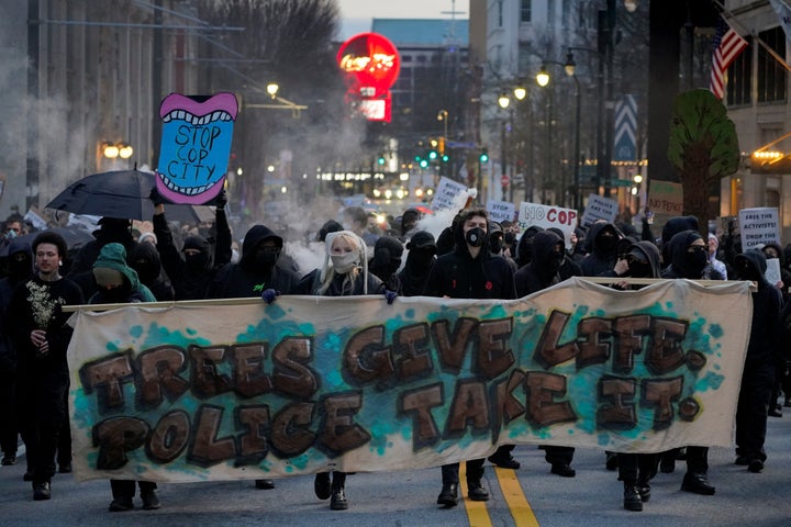 Protesters demonstrate Jan. 21 against the killing of activist Tortuguita during a police raid of Weelaunee People's Park, the planned site of a controversial "Cop City" project, in Atlanta.