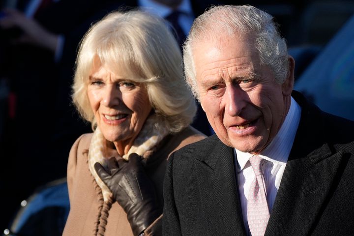 BOLTON, ENGLAND - JANUARY 20: King Charles III and Camilla, Queen Consort leave Bolton Town Hall during a tour of Greater Manchester on January 20, 2023 in Bolton, United Kingdom.  (Photo by Christopher Furlong / Getty Images)