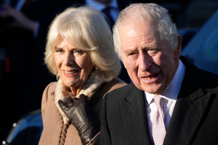 BOLTON, ENGLAND - JANUARY 20: King Charles III and Camilla, Queen Consort leave Bolton Town Hall during a tour of Greater Manchester on January 20, 2023 in Bolton, United Kingdom. (Photo by Christopher Furlong/Getty Images)