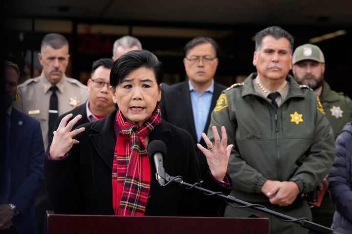 Rep. Judy Chu, D-Calif., left, addresses the media with Los Angeles County Sheriff Robert Luna, right, outside the Civic Center in Monterey Park, Calif., on Jan. 22, 2023.
