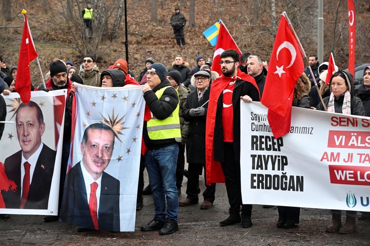 Members of pro-Turkish organization Union of European Turkish Democrats (UETD) demonstrate in support of Turkey and President Recep Tayyip Erdogan outside the Turkish embassy in Stockholm, Sweden January 21, 2023. TT News Agency/Christine Olsson via REUTERS ATTENTION EDITORS - THIS IMAGE WAS PROVIDED BY A THIRD PARTY. SWEDEN OUT. NO COMMERCIAL OR EDITORIAL SALES IN SWEDEN.