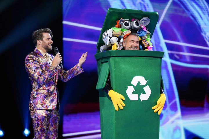 Stephen with Masked Singer host Joel Dommett after his unmasking