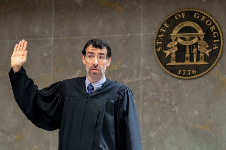 Fulton County Superior Court Judge Robert McBurney swears in potential jurors during proceedings to seat a special purpose grand jury in Atlanta, on May 2, 2022. 