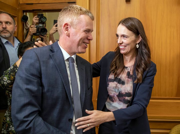 New Zealand Prime Minister Jacinda Ardern, right, and new Labour Party leader Chris Hipkins arrive for their caucus vote at Parliament in Wellington, on Jan. 22, 2023. Hipkins got the unanimous support of lawmakers from his party after he was the only candidate to enter the contest to replace Ardern, who shocked the nation of 5 million people last Thursday when she announced she was resigning. 