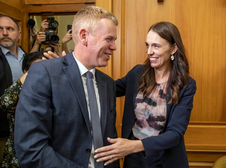 New Zealand Prime Minister Jacinda Ardern, right, and new Labour Party leader Chris Hipkins arrive for their caucus vote at Parliament in Wellington, on Jan. 22, 2023. Hipkins got the unanimous support of lawmakers from his party after he was the only candidate to enter the contest to replace Ardern, who shocked the nation of 5 million people last Thursday when she announced she was resigning.
