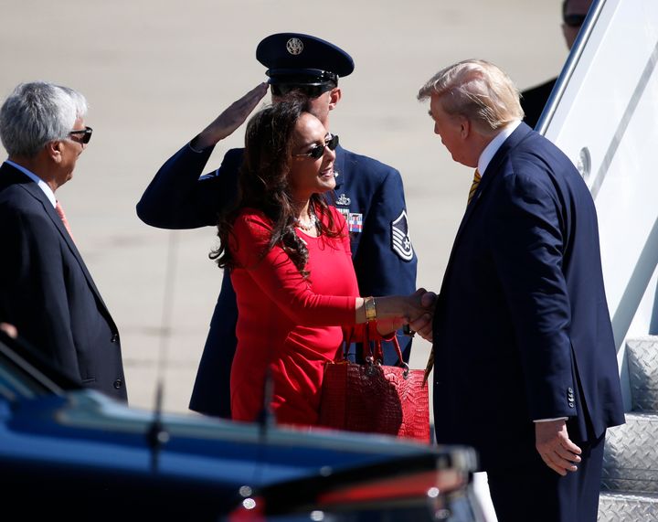 Harmeet Dhillon greets President Donald Trump after he arrives aboard Air Force One at Moffett Federal Airfield in Mountain View, California, Sept. 17, 2019.