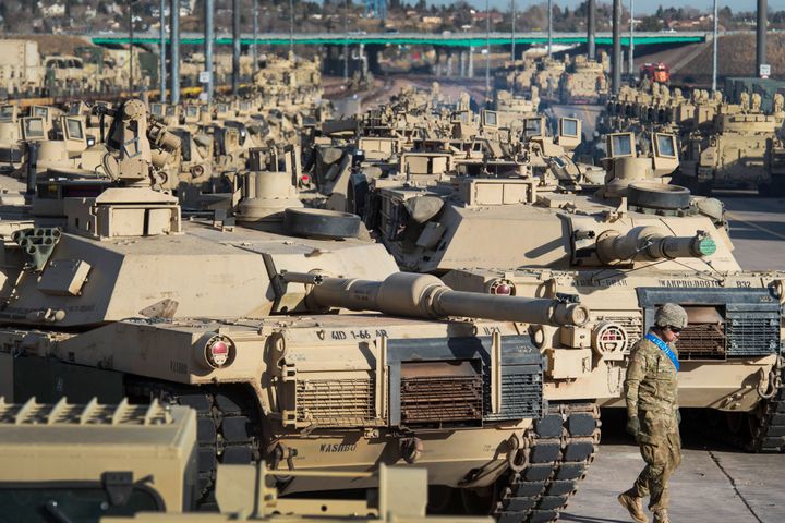 A soldier walks past a line of M1 Abrams tanks, Nov. 29, 2016, at Fort Carson in Colorado Springs, Colo. In what would be a reversal, the Biden administration is poised to approve sending M1 Abrams tanks to Ukraine, U.S. officials said Tuesday, as international reluctance toward sending tanks to the battlefront against the Russians begins to erode. The decision could be announced as soon as Wednesday though it could take months or years for the tanks to be delivered.