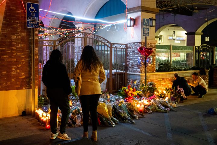 Mourners attend a candlelight vigil for the victims of a mass shooting in Monterey Park, a suburb of Los Angeles.