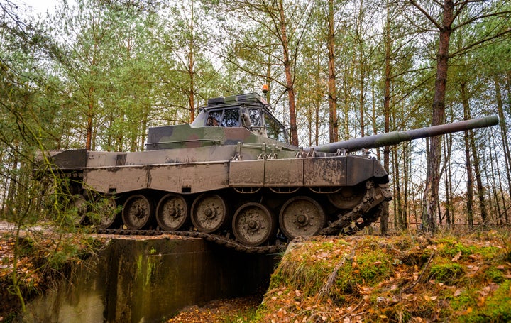 <strong>A Slovakian soldier drives a Bundeswehr Leopard 2 training tank.</strong>